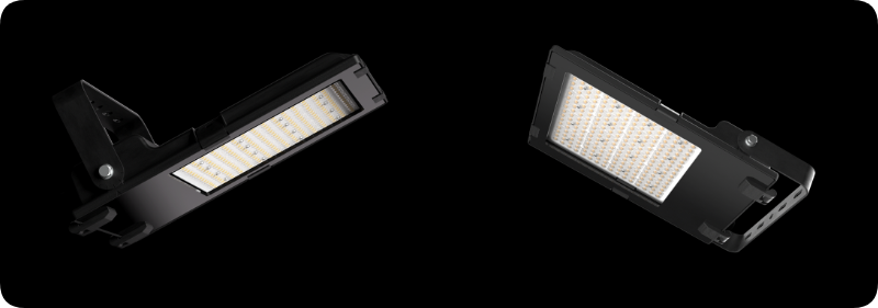 Compact black die-cast aluminum LED floodlight showing front tempered glass and slim profile